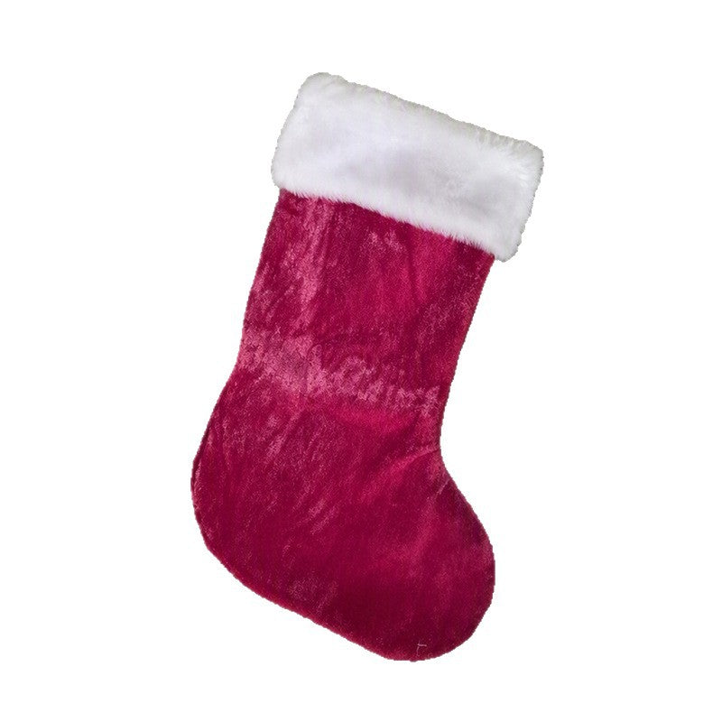 Dark pink stocking on a plain background