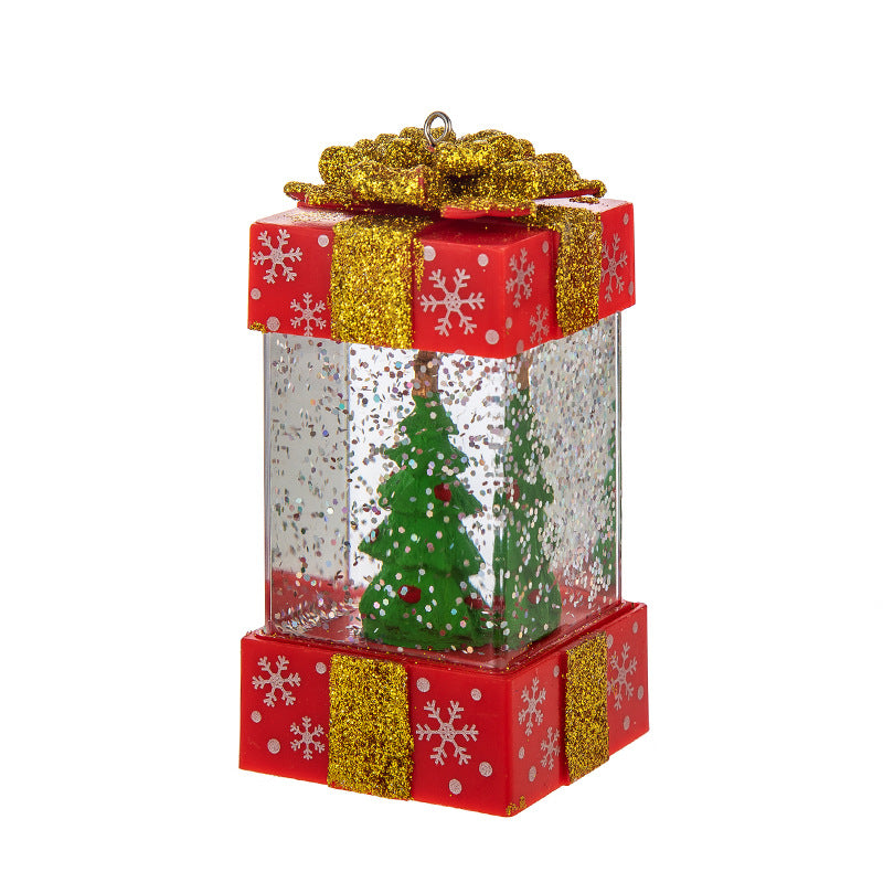 Red gift box globe with Christmas tree scene