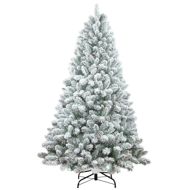 Snow-flocked artificial Christmas tree on its stand