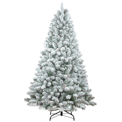 Snow-flocked artificial Christmas tree on its stand