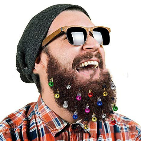 Man wearing Christmas bauble clips in his beard