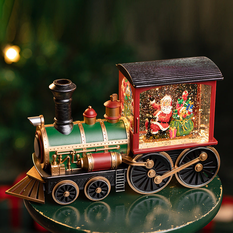Christmas locomotive snow globe on display