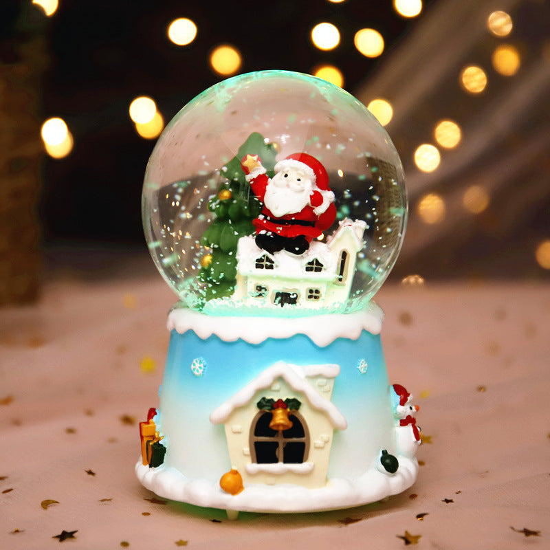Santa globe on a pale blue snowy house base
