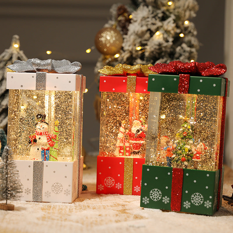 Lighted present-shaped Christmas decorations in several colors