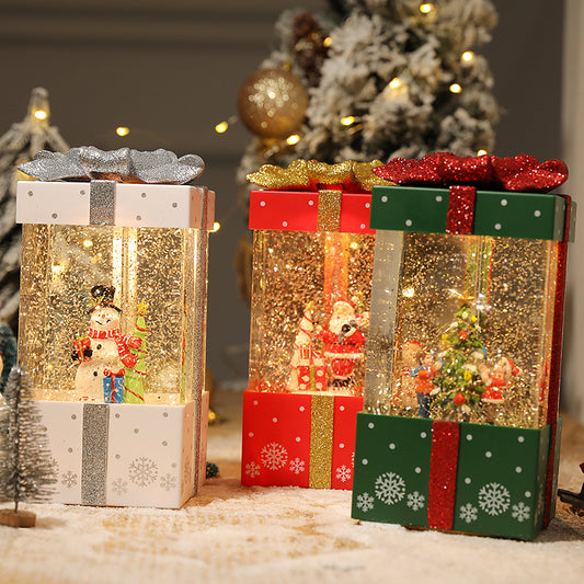 Lighted present-shaped Christmas decorations in several colors
