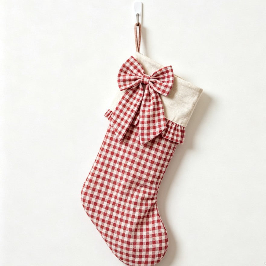 Pink plaid stocking with a large bow