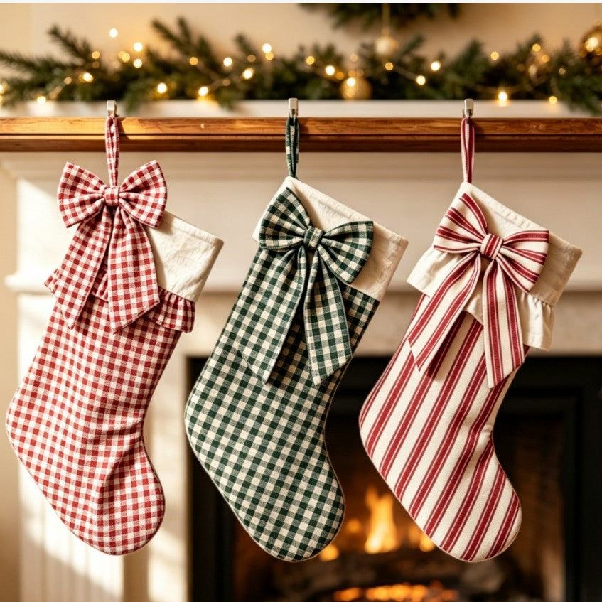 Bow stockings on a holiday mantel