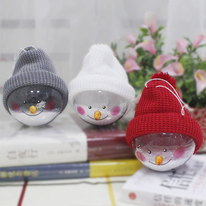 Snowman ball ornaments with gray, white and red hats