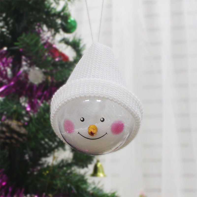 White-hat snowman ornament on a Christmas tree