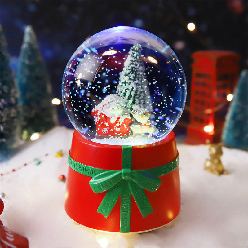 Christmas tree globe on a red bow-detail base