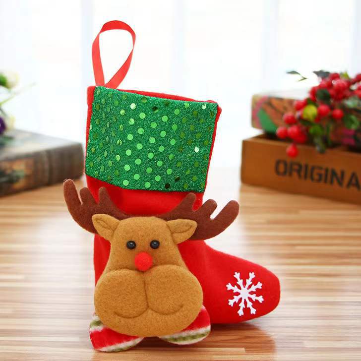 Red reindeer stocking with green cuff