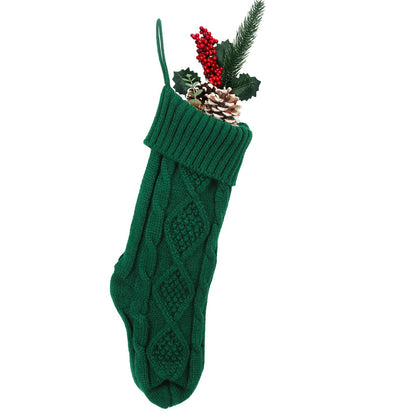 Green cable-knit Christmas stocking