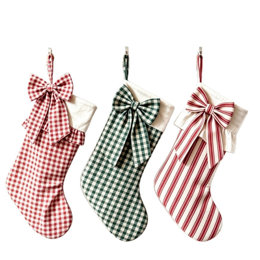 Three bow stocking patterns on a white background