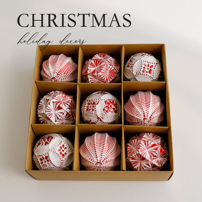 Rose gold-tone baubles in a holiday display