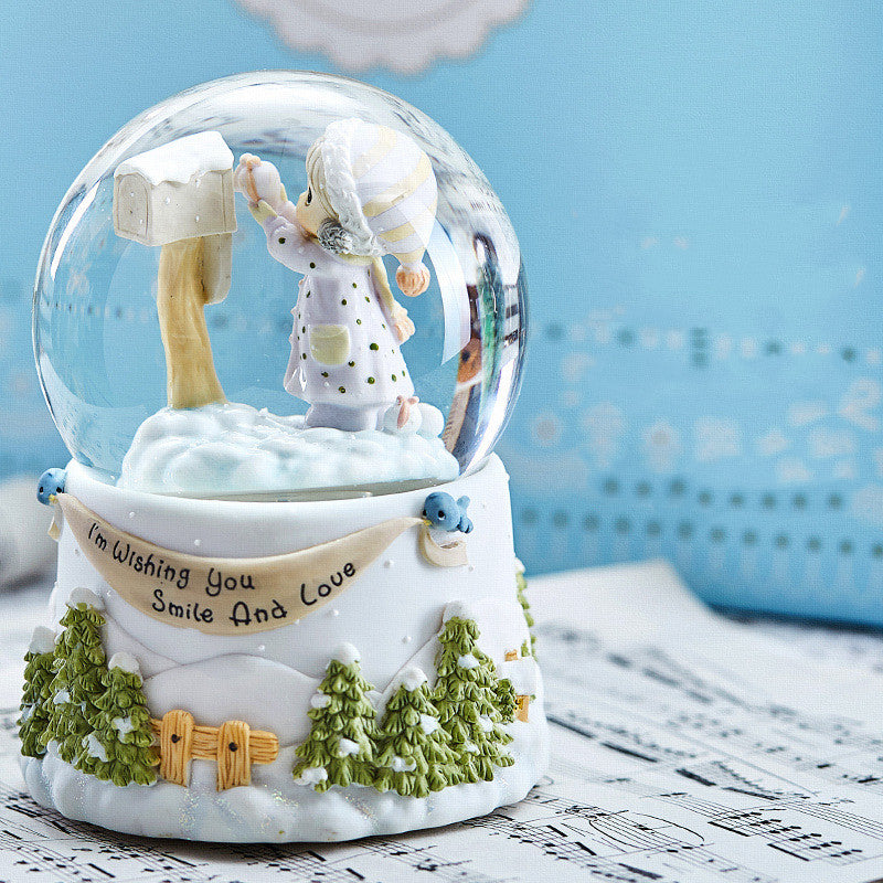 Decorative snow globe with white base