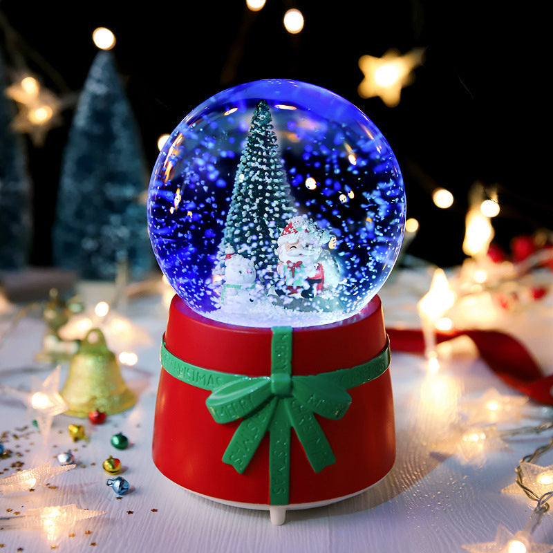 Christmas tree globe on red base with green bow