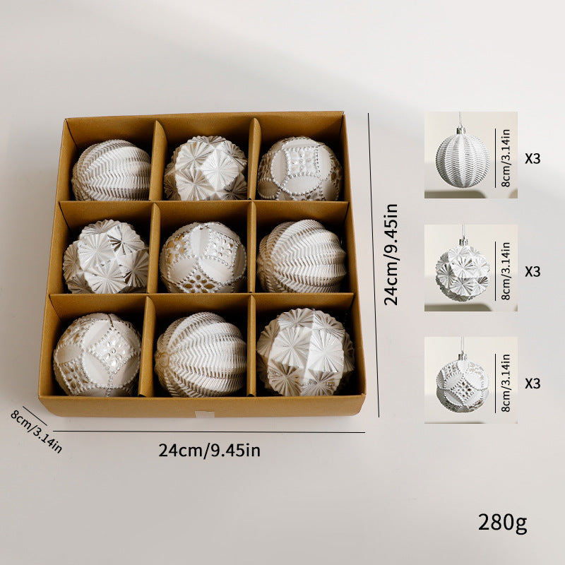 Gold-tone 9-piece bauble set with size illustration