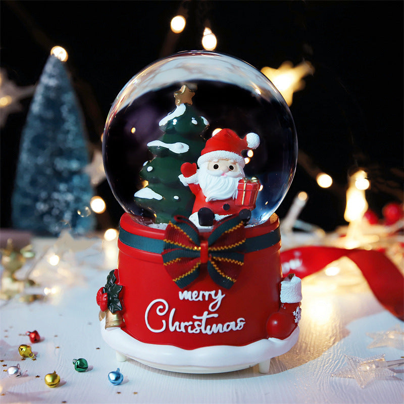 Santa snow globe on a red Merry Christmas base