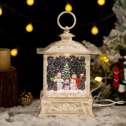 White snowman lantern beside festive decorations