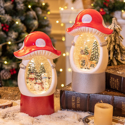 Mushroom Christmas snow globes beside a decorated tree