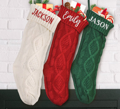 Red, green and cream knit stockings with display names