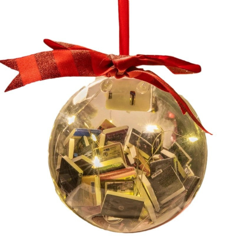 Miniature book ornament on a white background