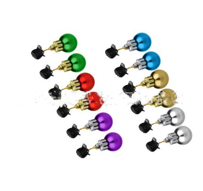 Colored miniature baubles with black clips