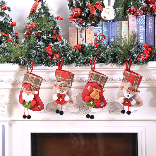 Mini character stockings hanging beneath a garland